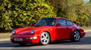 Red Porsche 911 Carrera car on street
