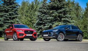 jaguar pace and porsche macan on road 