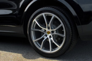 porsche emblem on clean shiny polished car wheels for porsche