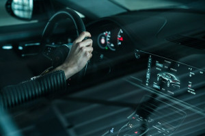 Woman driving Porsche car with InnoDrive